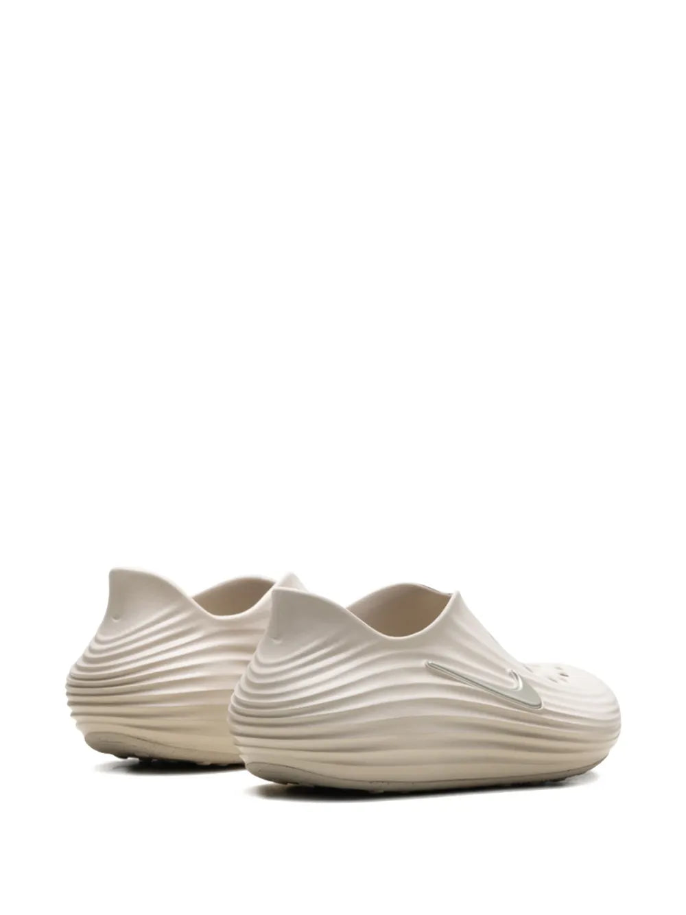 Nike Reactx Rejuven8 beige clog pair with ribbed sides and Swoosh