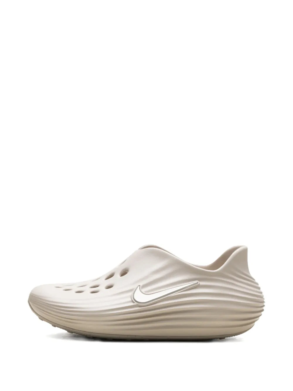 Nike Reactx Rejuven8 beige slip-on clog side view with Swoosh