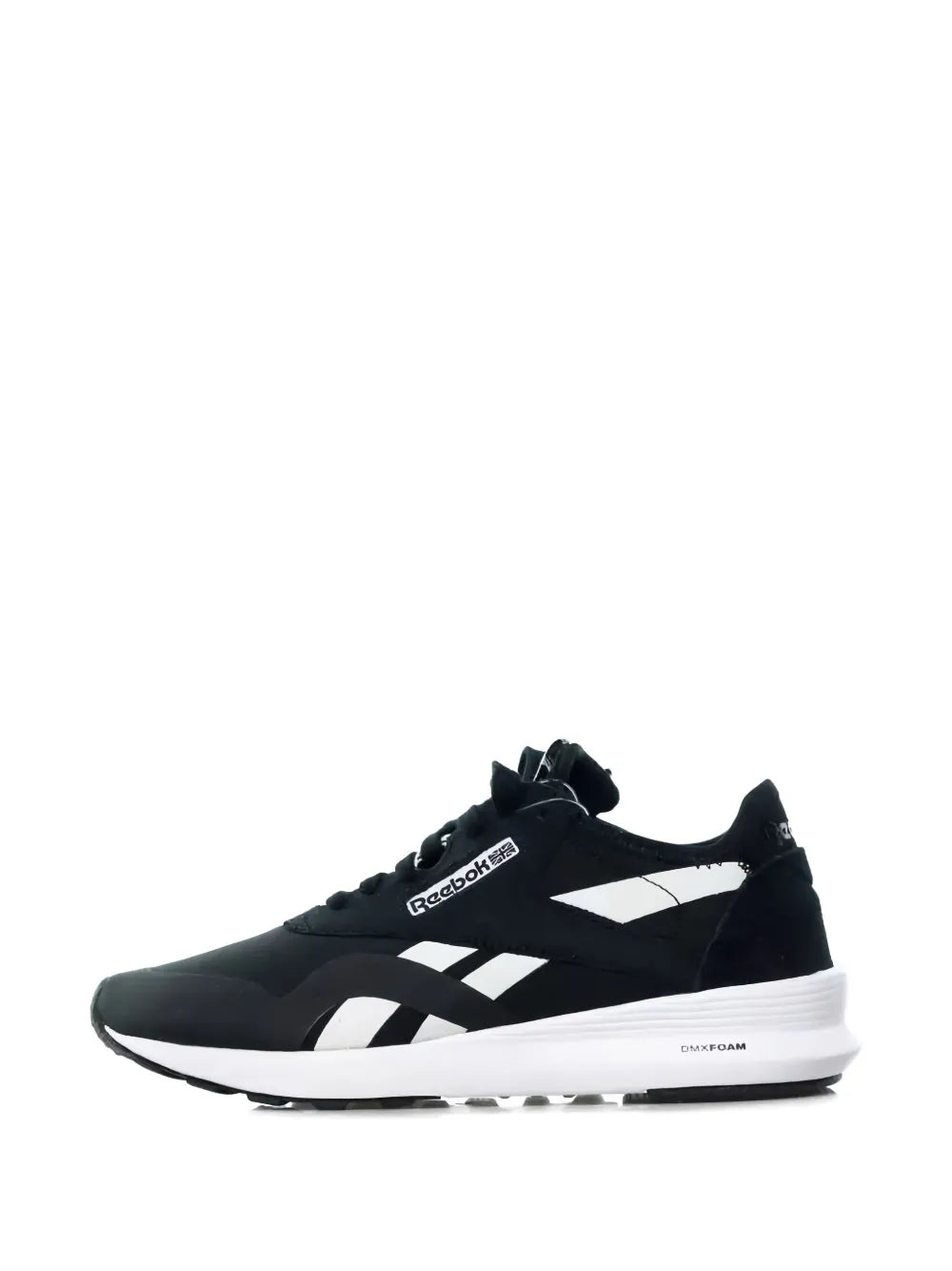 Black Reebok trainers with white side stripes, lace-up closure, low-profile sole.