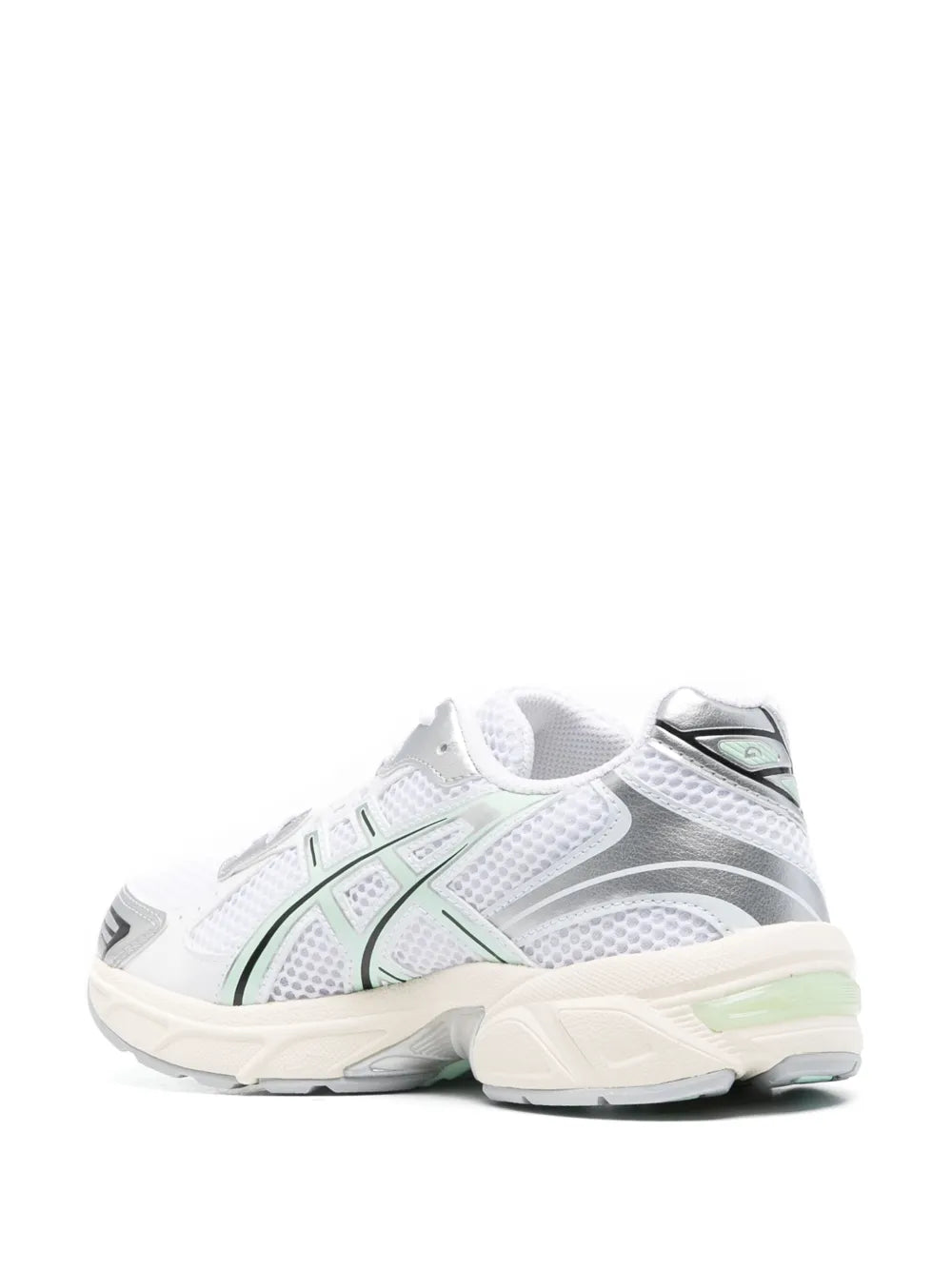 White sneakers with mint logo stripes and cushioned cream sole.