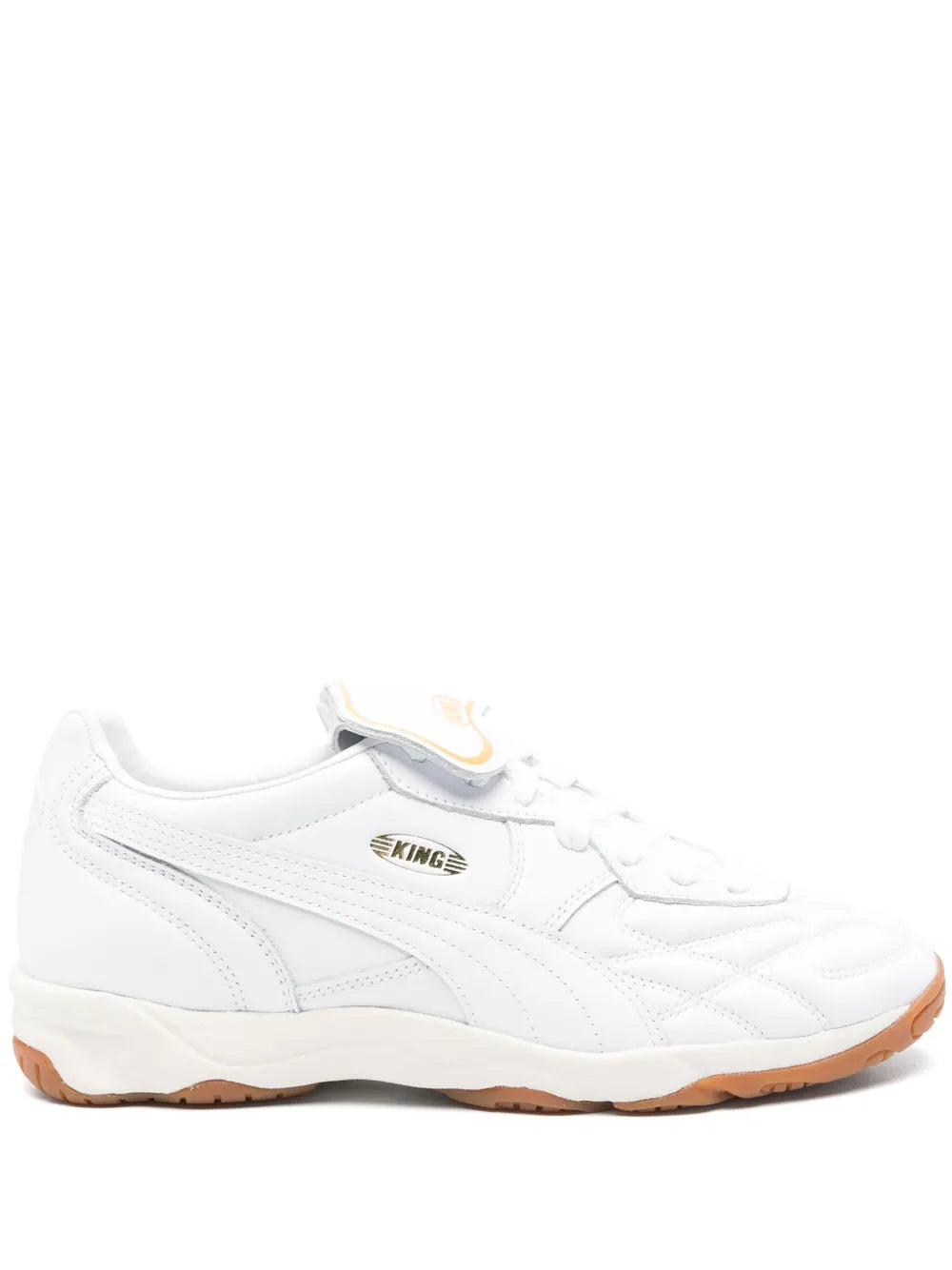 White PUMA King indoor soccer shoe with lace-up front and brown gum sole