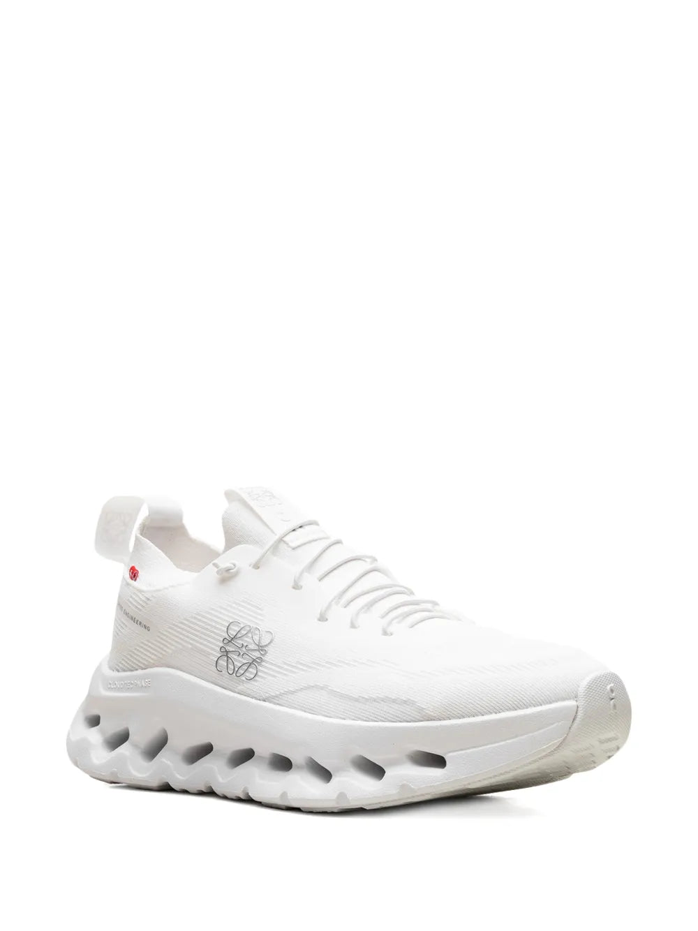 White Cloudtilt low-top sneaker, side view with lace-up and pod sole