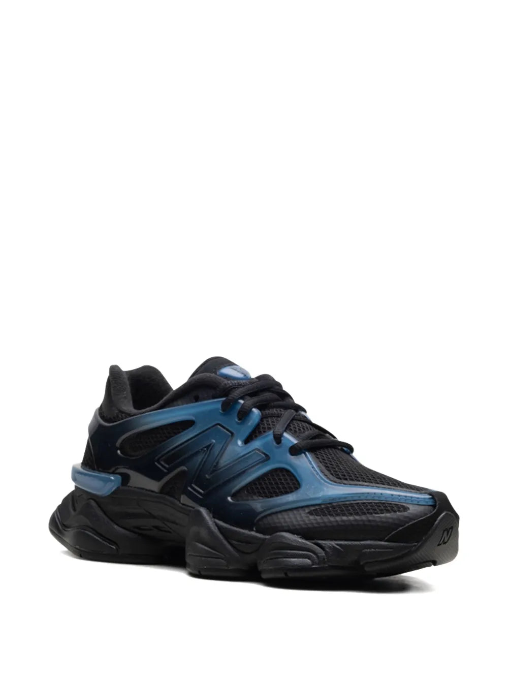 New Balance 9060 side view sneakers, dark navy uppers with blue accents and black sole