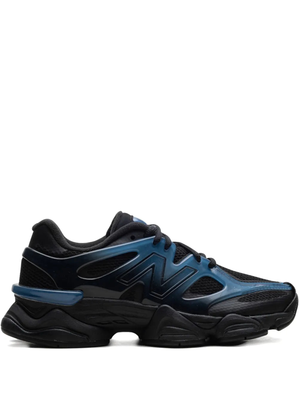 New Balance 9060 running sneakers with navy-to-blue gradient panels, black sole