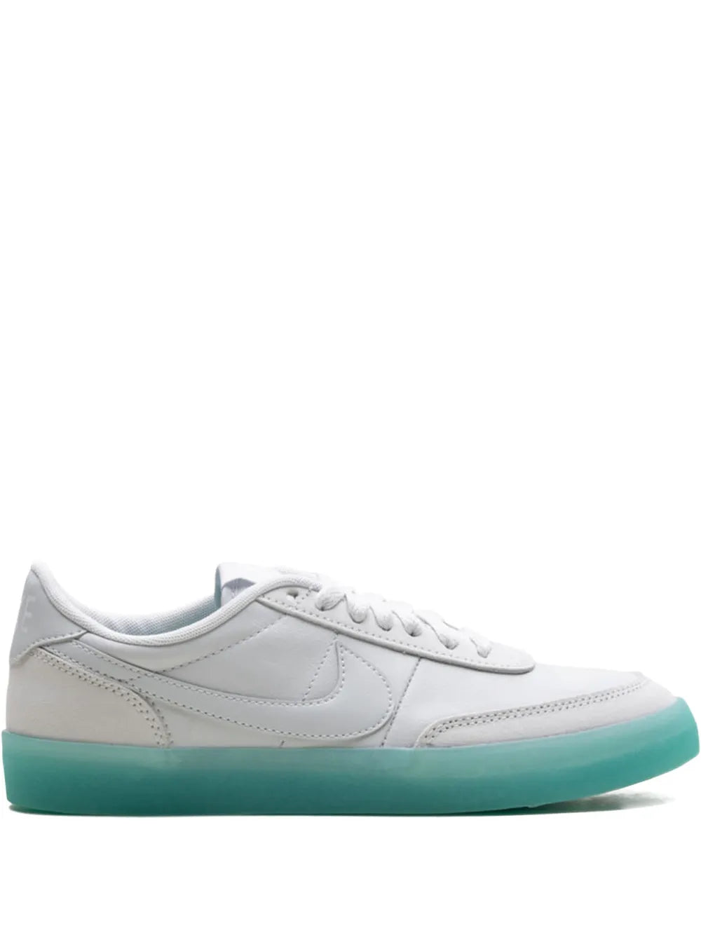 White low-top sneakers with Nike swoosh and teal rubber sole