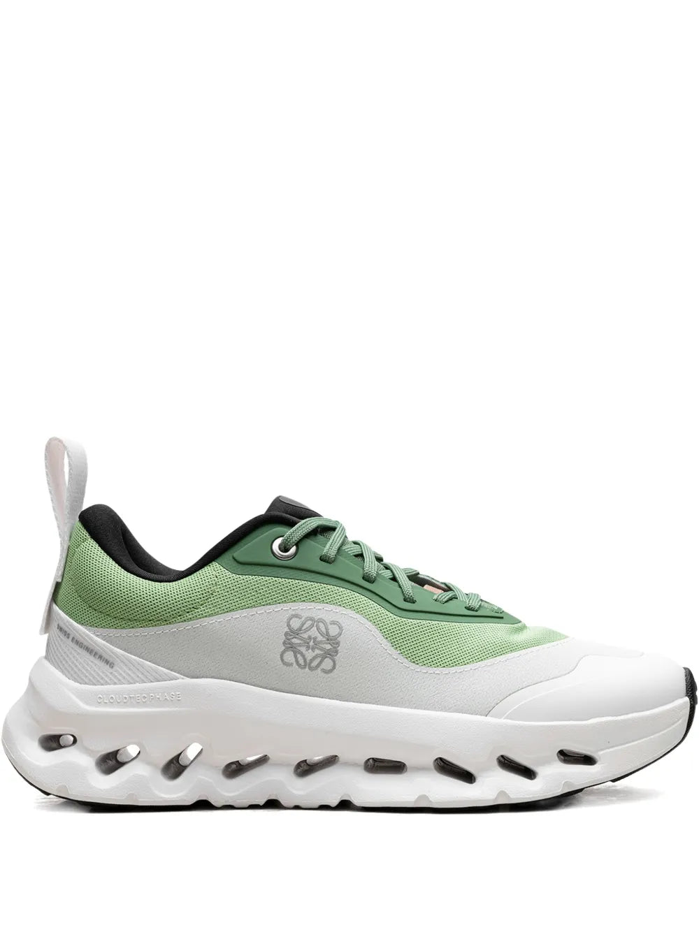 Green and white lace-up sneakers with chunky tread sole and contrast black tongue