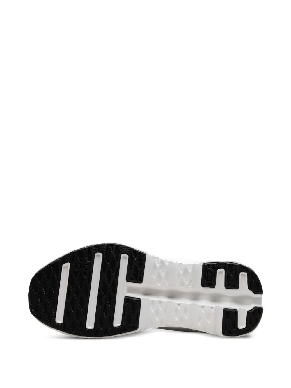 White and black rubber outsole with tread pattern for grip