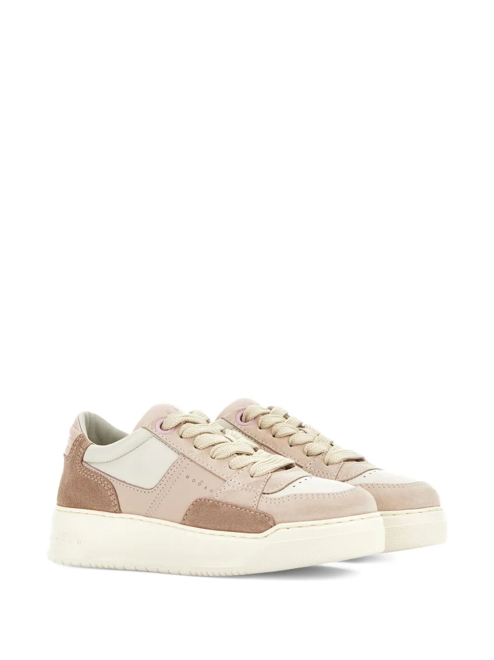Low-top lace-up sneakers in pink and tan with colorblock uppers and white rubber sole