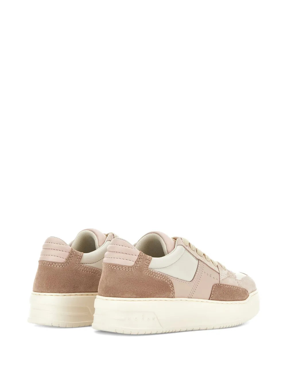Pink and tan low-top sneakers showing the heel and rear with white cushioned sole