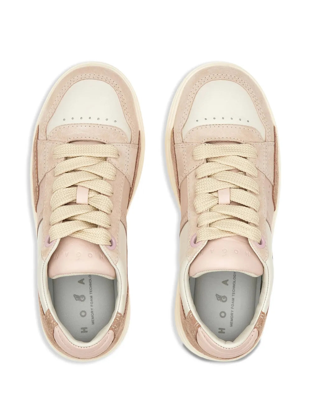 Pair of pink and tan lace-up sneakers with rounded toe and cushioned white sole