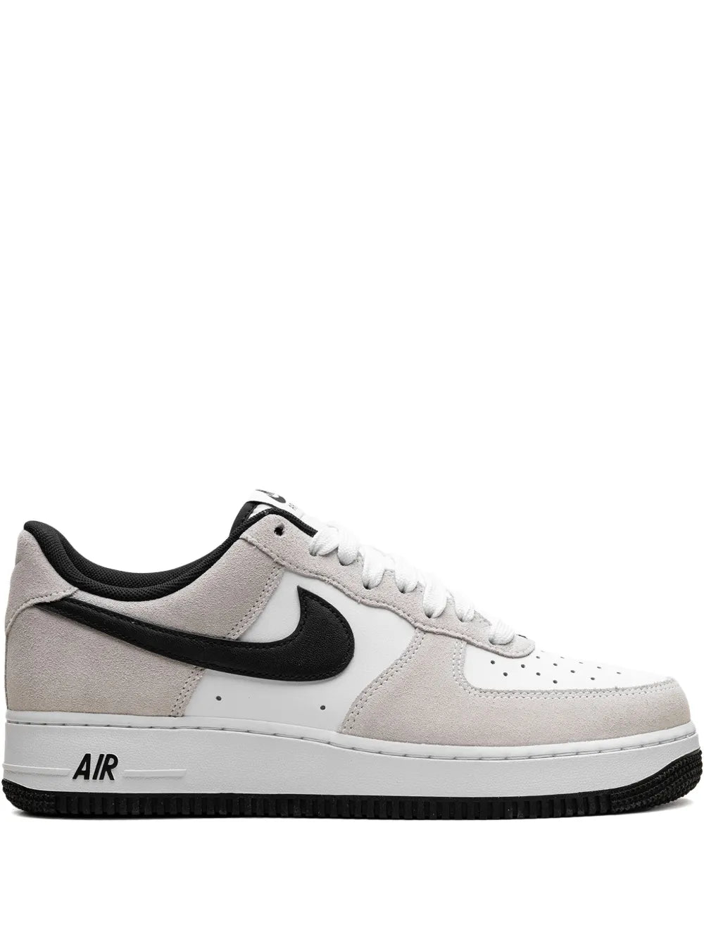 Low-top Nike Air Force 1 sneakers, white and beige with black swoosh and laces