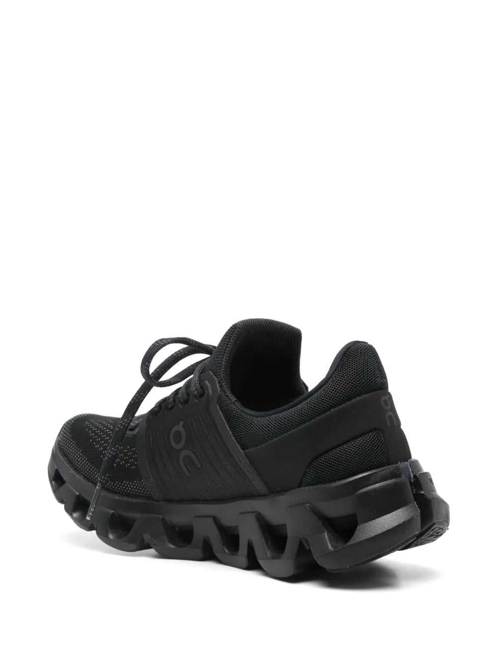 Black mesh sneaker with lace-up design and thick platform tread sole