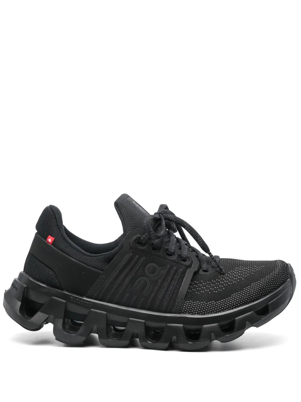 Black lace-up running shoe with mesh upper and chunky tread sole