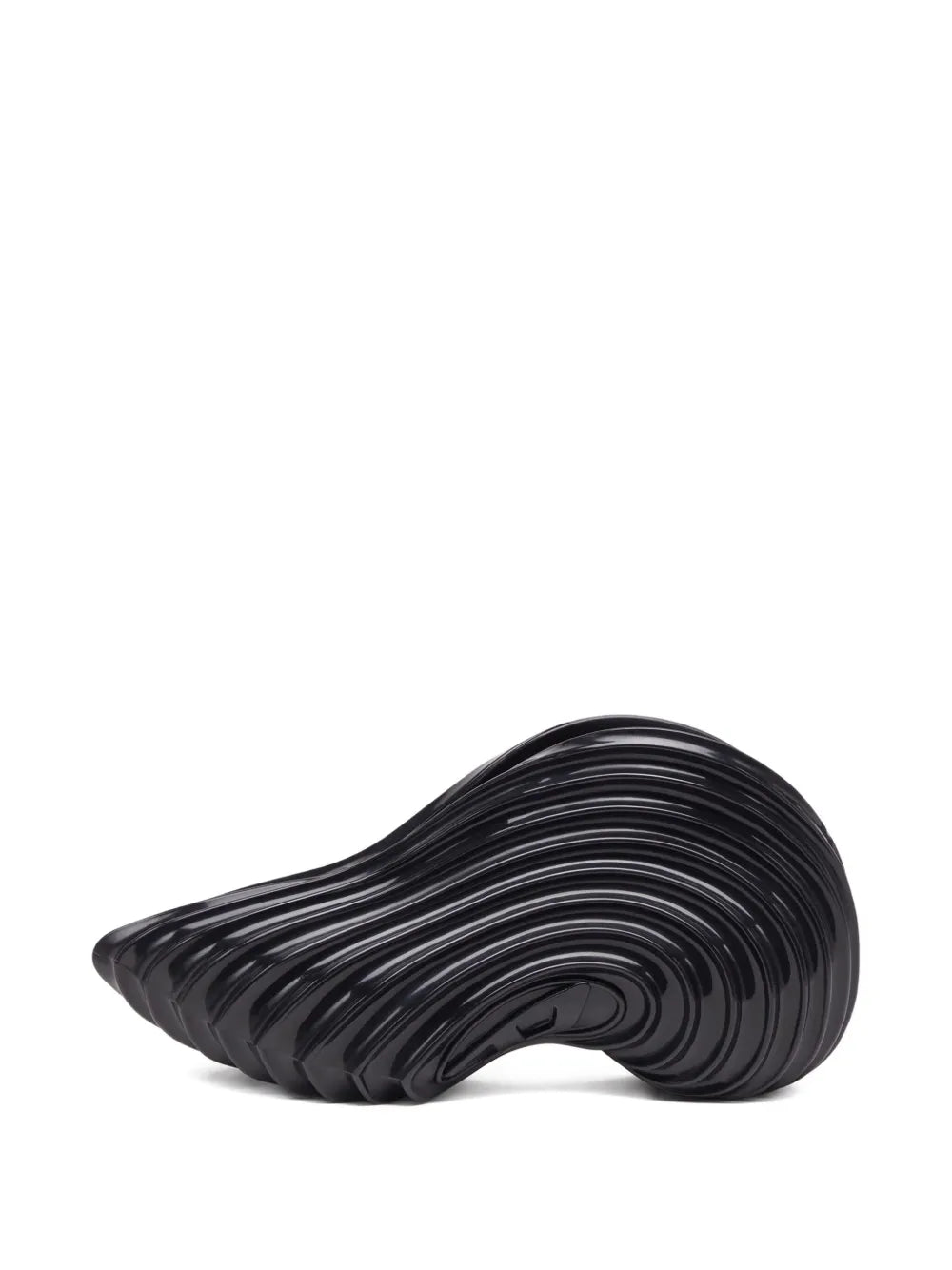 Black ribbed slip-on shoes with arched profile and glossy circular traction lines