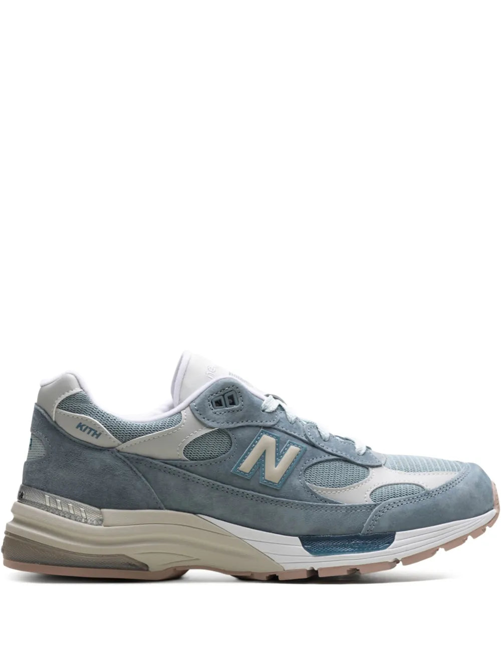 Blue and gray lace-up sneakers with New Balance N logo, mesh panels, and suede overlays.