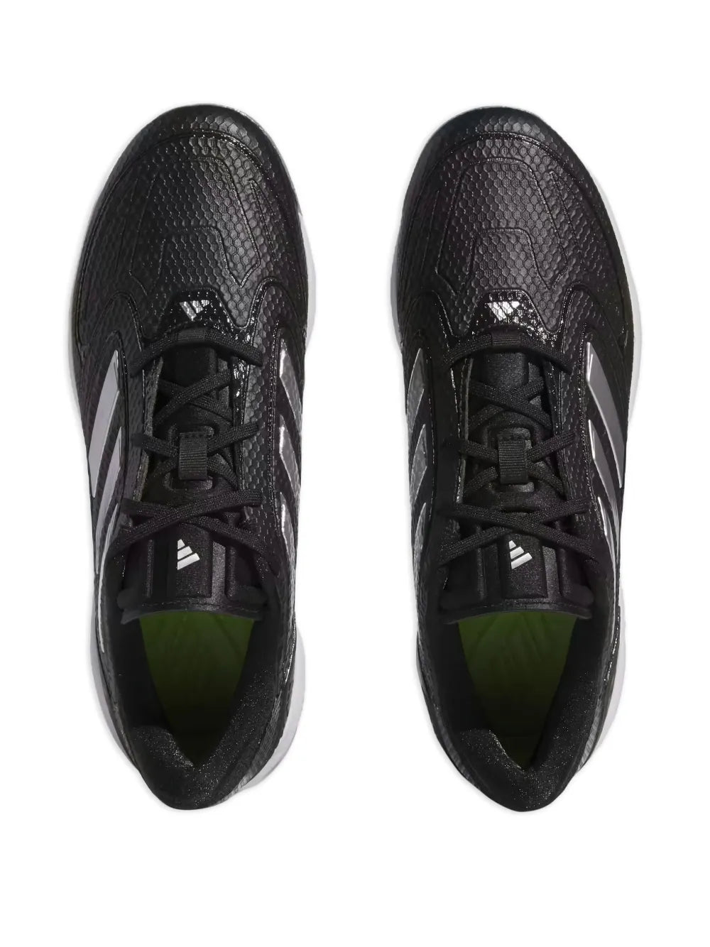 Black Adidas cleat shoes with lace-up closure and textured upper, top view