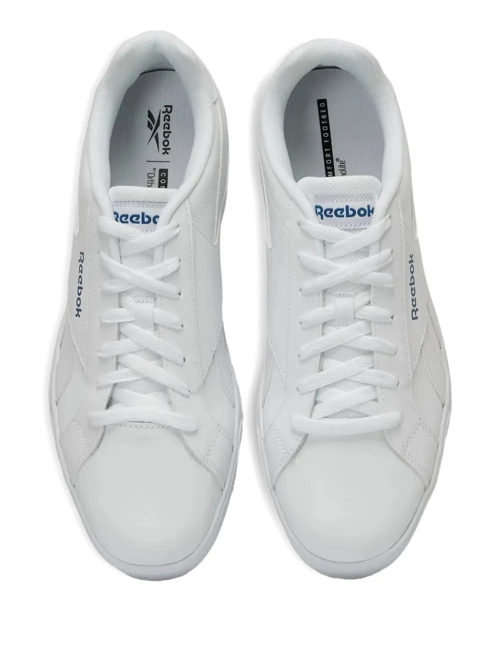 Pair of white Reebok low-top sneakers showing lace-up and padded collars