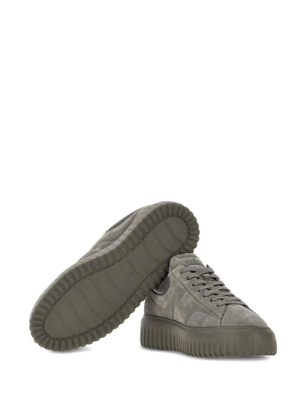Grey suede sneakers with textured rubber outsole, shown from side and underside