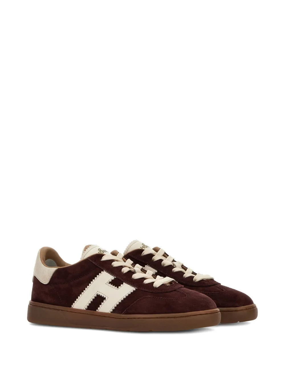 Brown suede sneakers with white side stripes and lace-up design