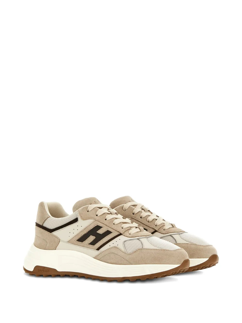 Pair of light beige lace-up sneakers, side view with black H logo