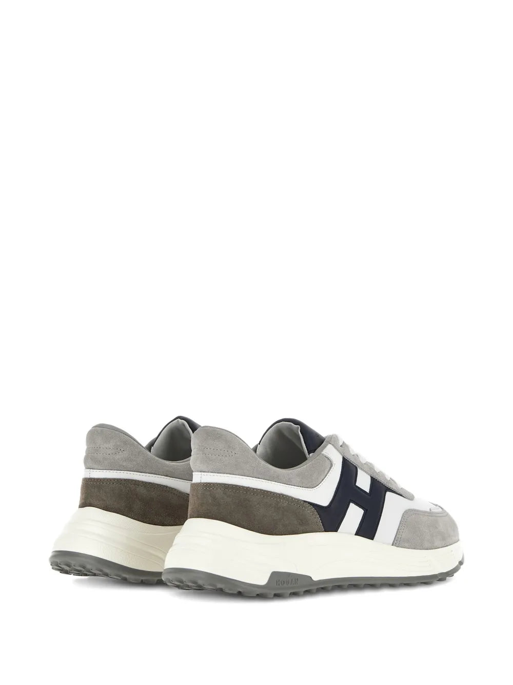 Gray, navy, and white low-top sneakers with rear heel tab and lace-up