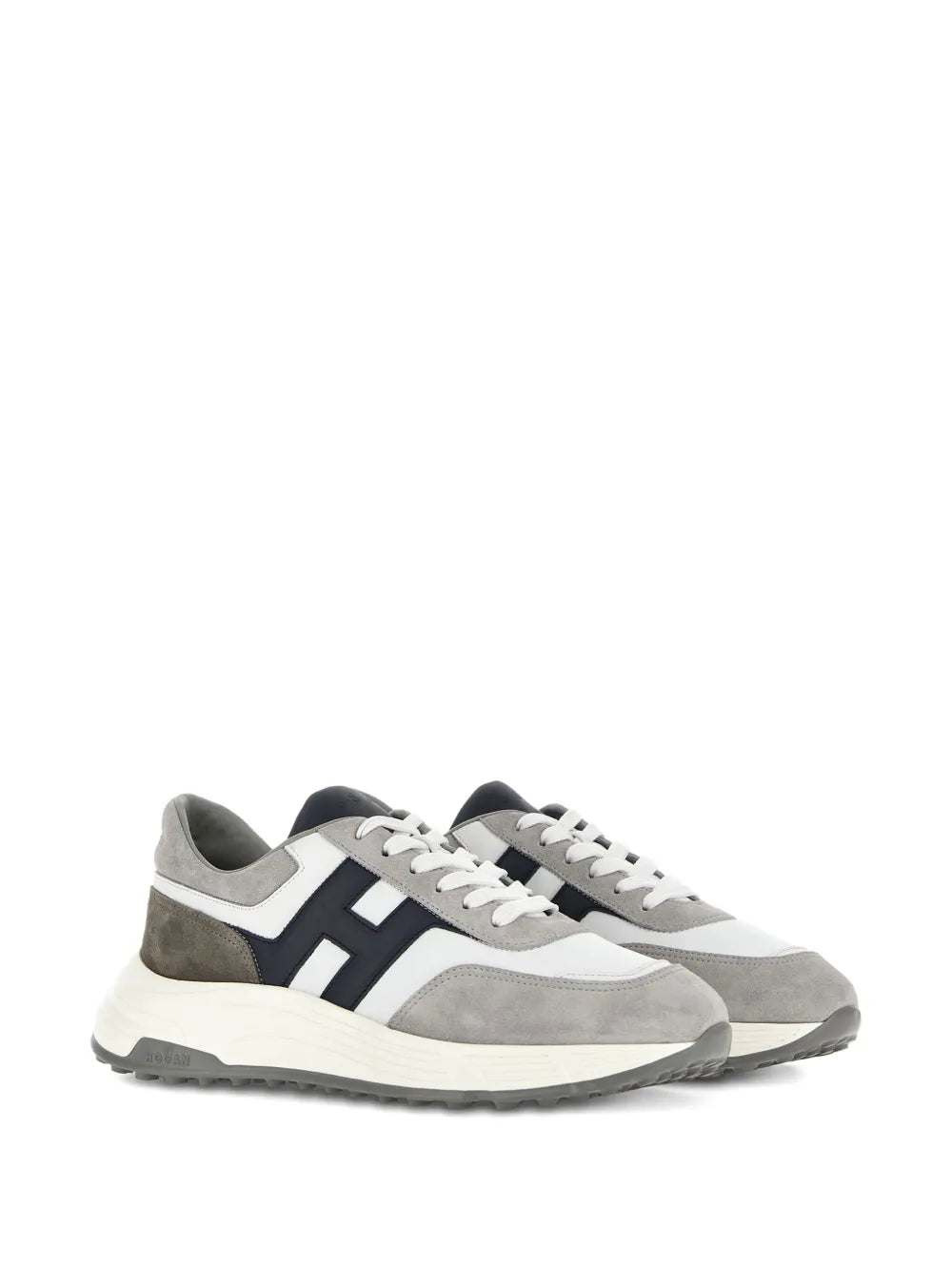 Lace-up sneakers in white, gray, and navy with side stripes and tread sole