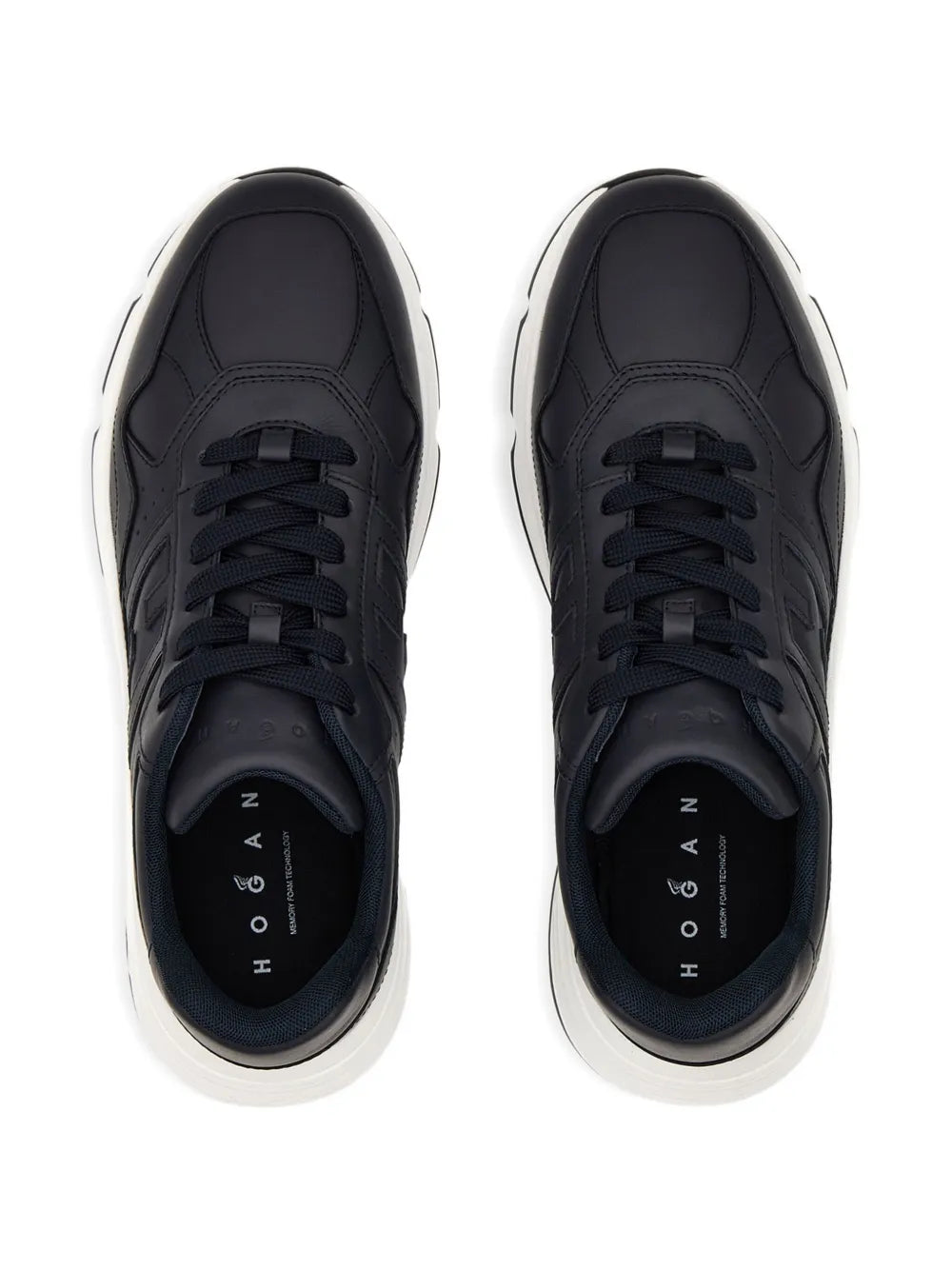 Dark blue lace-up sneakers, front view with white rubber sole edges