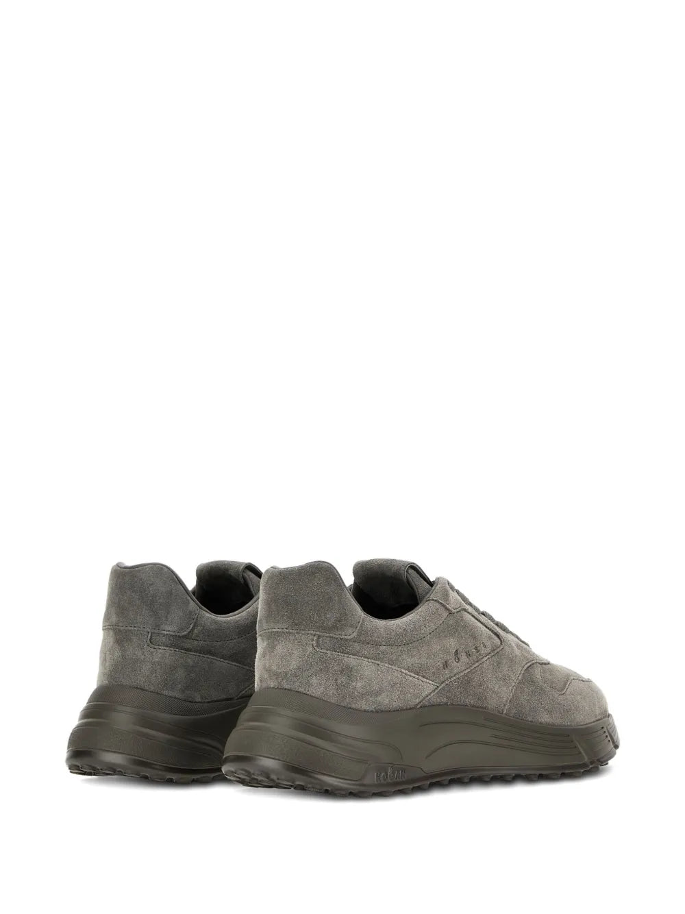 Khaki sneakers rear three-quarter view with sculpted rubber sole