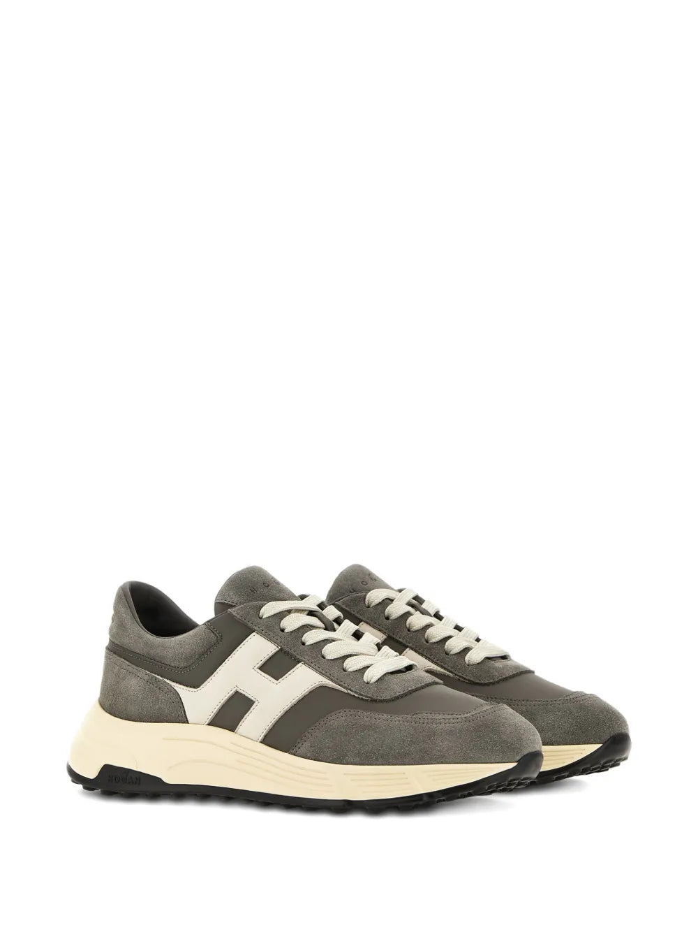 Grey lace-up sneakers with white H side stripes and cream midsole, side view
