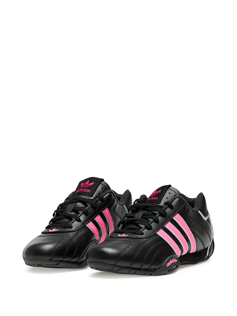 Black low-top sneakers with pink adidas-style stripes, lace-up design, and logo accents