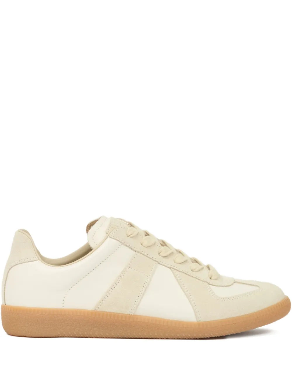 Beige low-top sneakers with lace-up front and gum rubber sole