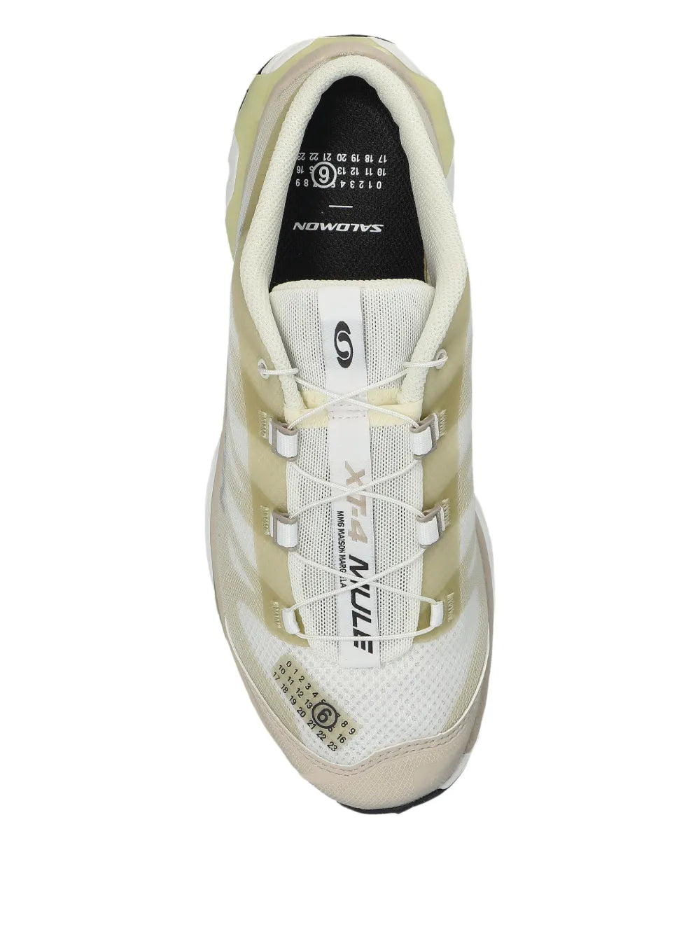 Beige lace-up sneaker with mesh upper, lace-up eyelets, and tongue label