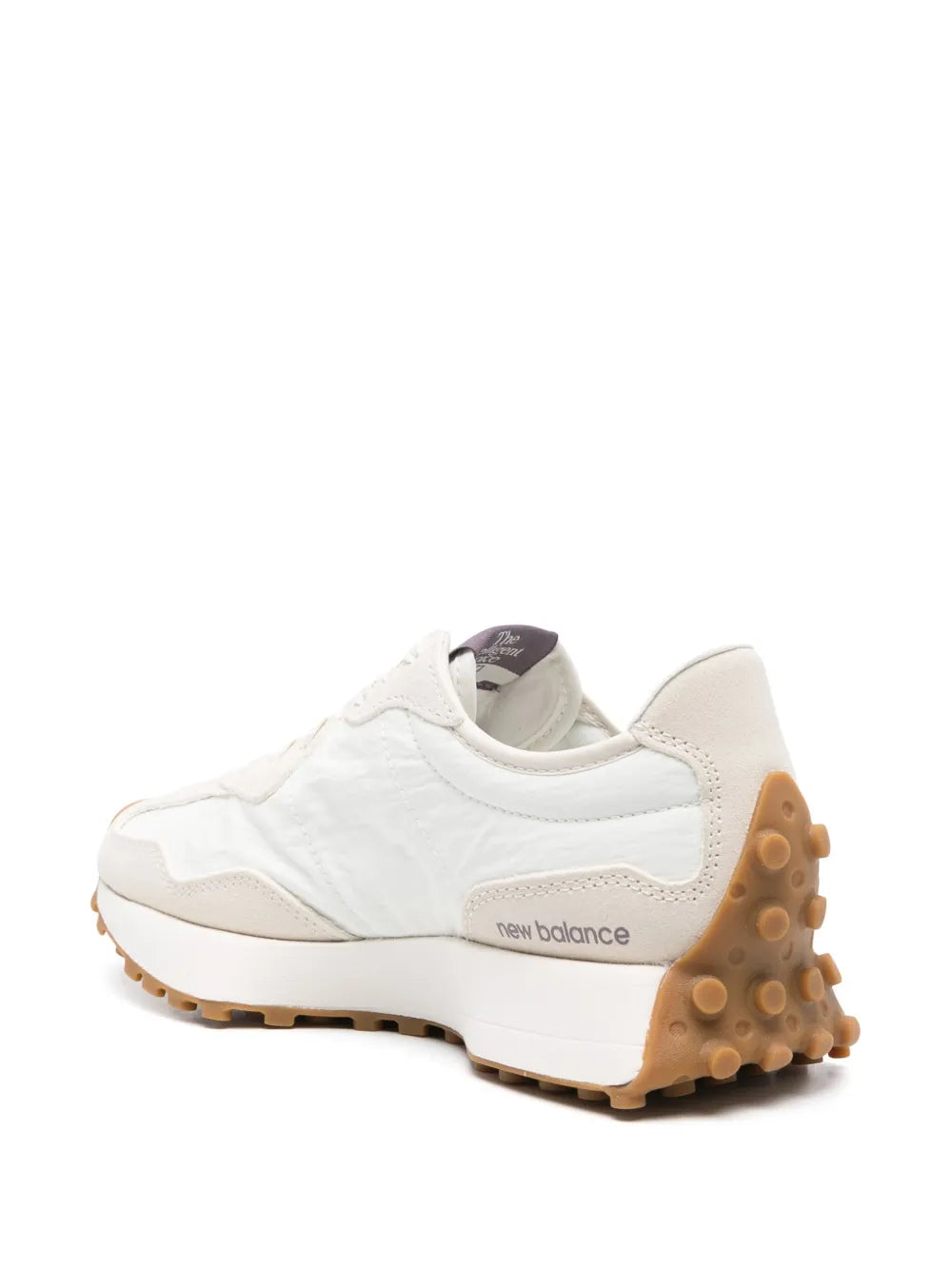 White retro sneaker with cushioned heel, New Balance logo, gum outsole