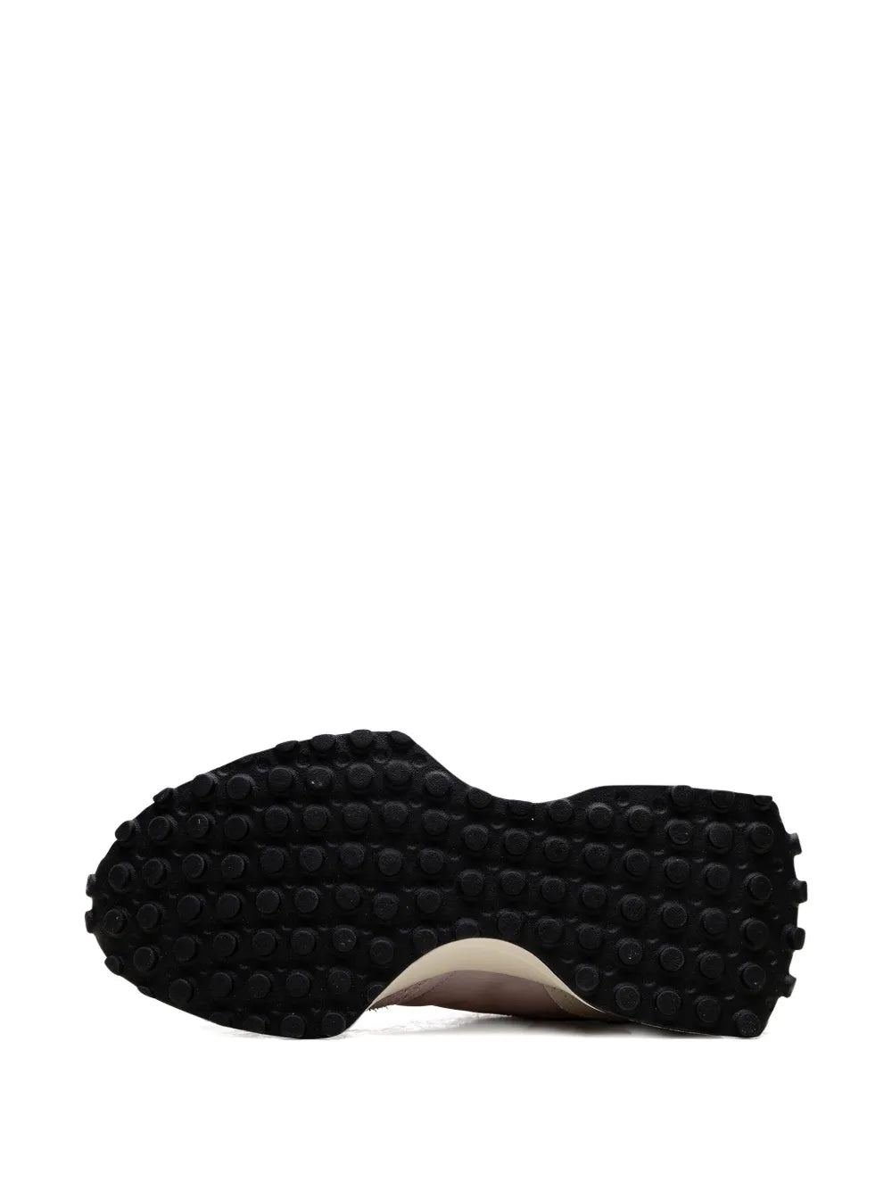 Black textured rubber outsole with traction studs and curved shape
