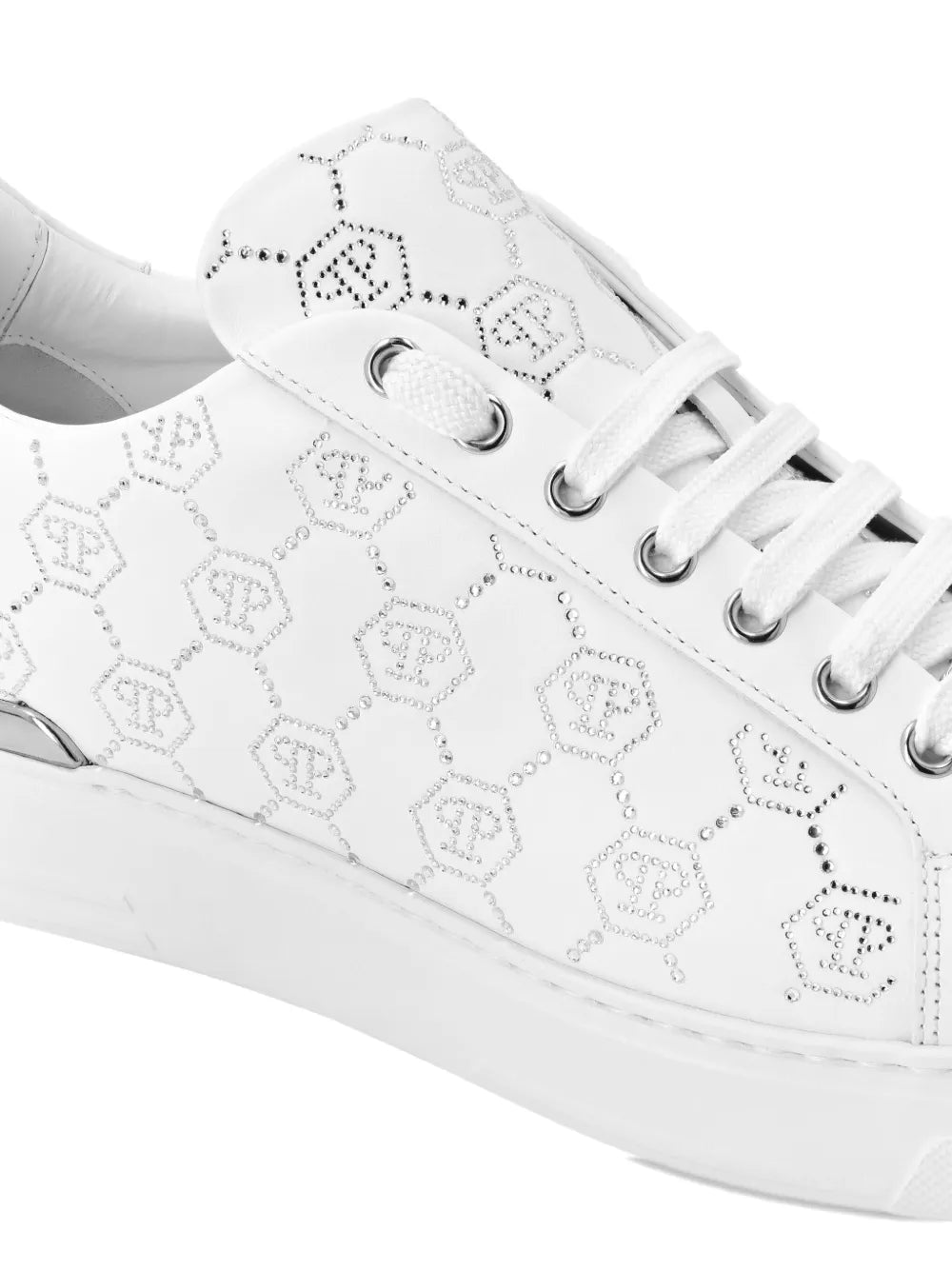 White sneaker toe and side panel with monogram strass pattern, laces and eyelets