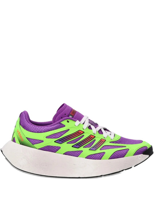 Purple and lime lace-up running shoe with white laces and thick gray midsole