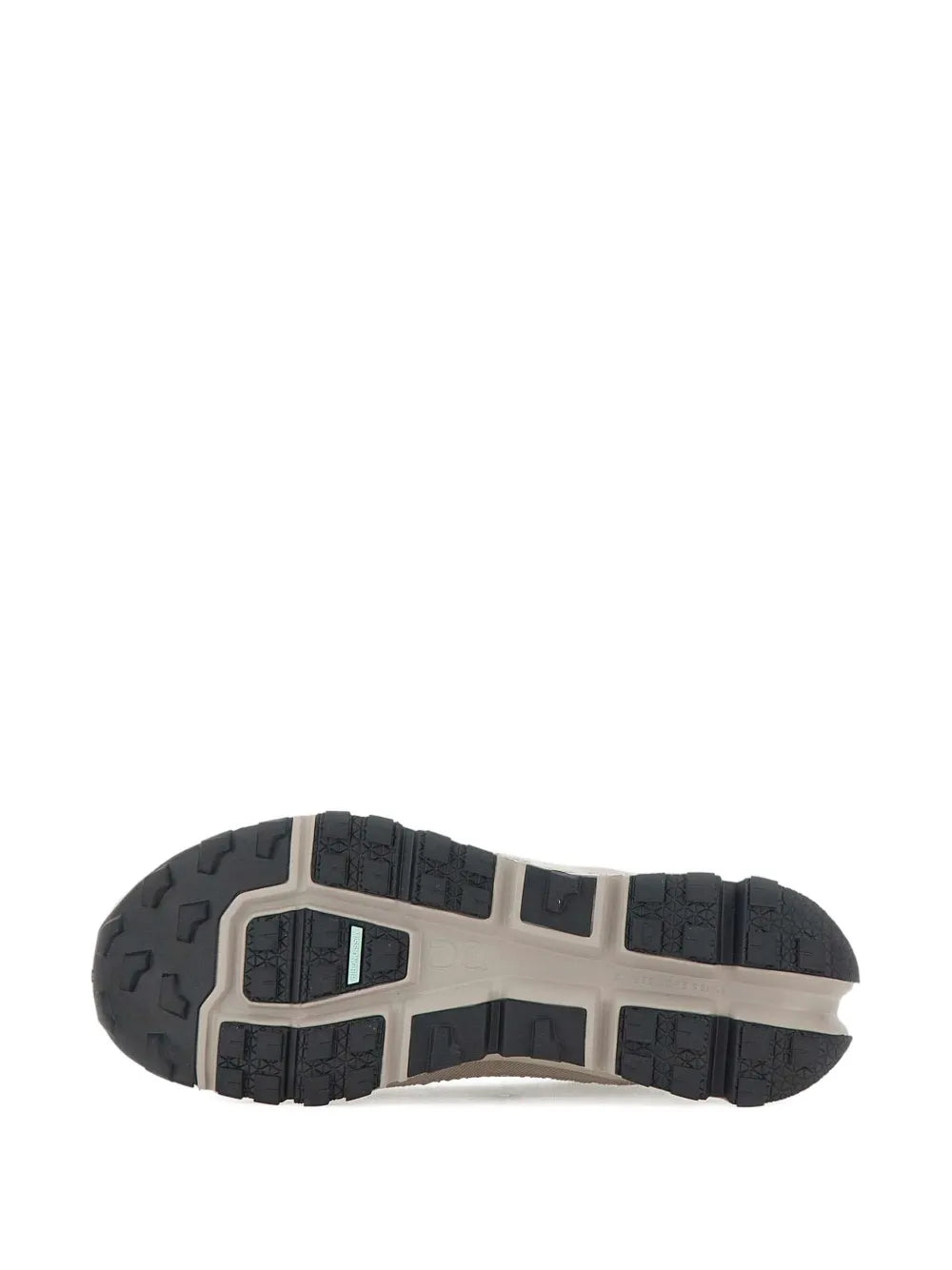 Grey running shoe outsole with blocky tread and grippy sidewall