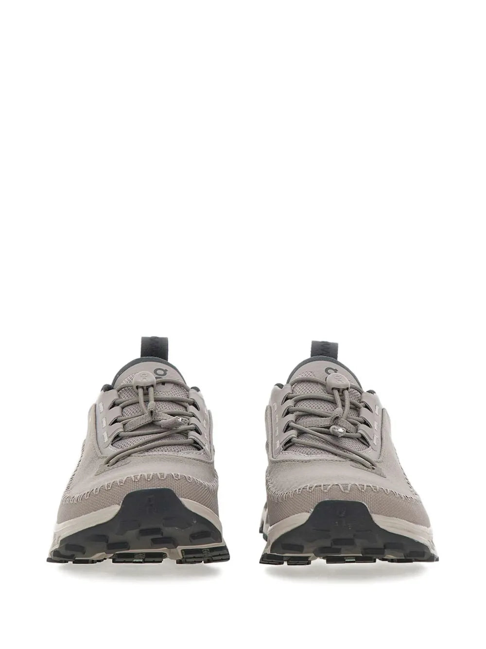 Pair of grey lace-up running shoes with front laces and rugged tread