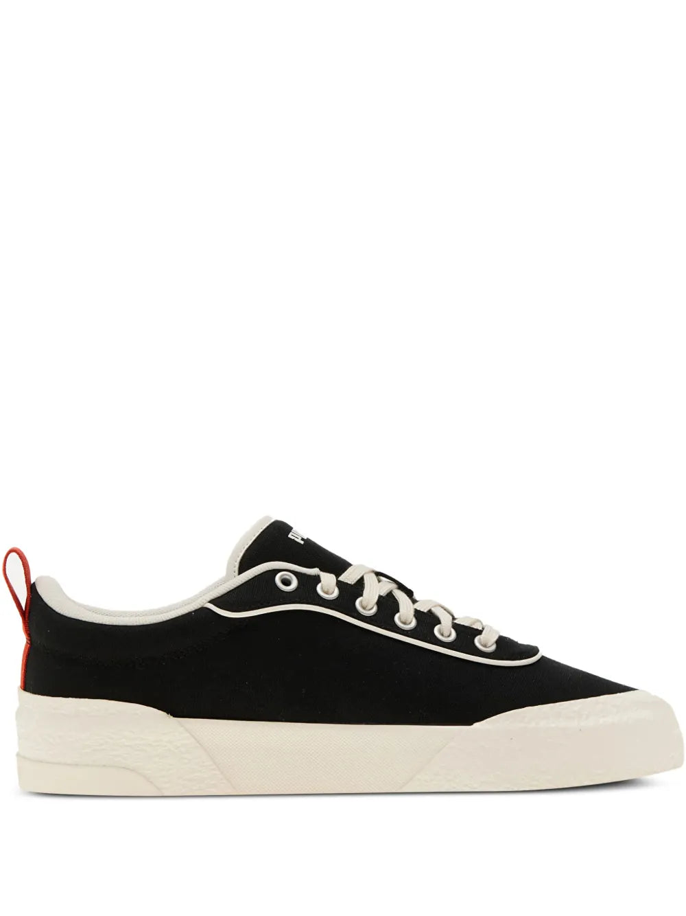 Black PUMA lace-up sneakers with white laces and off-white rubber sole