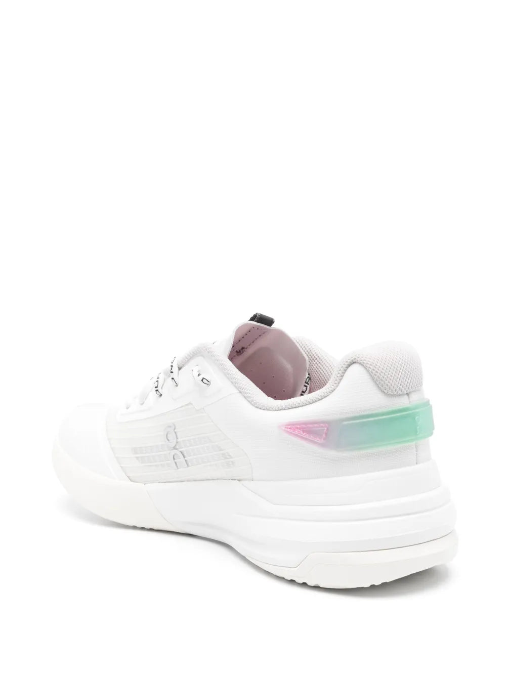 White running sneaker with mint heel panel and pink side stripe accents