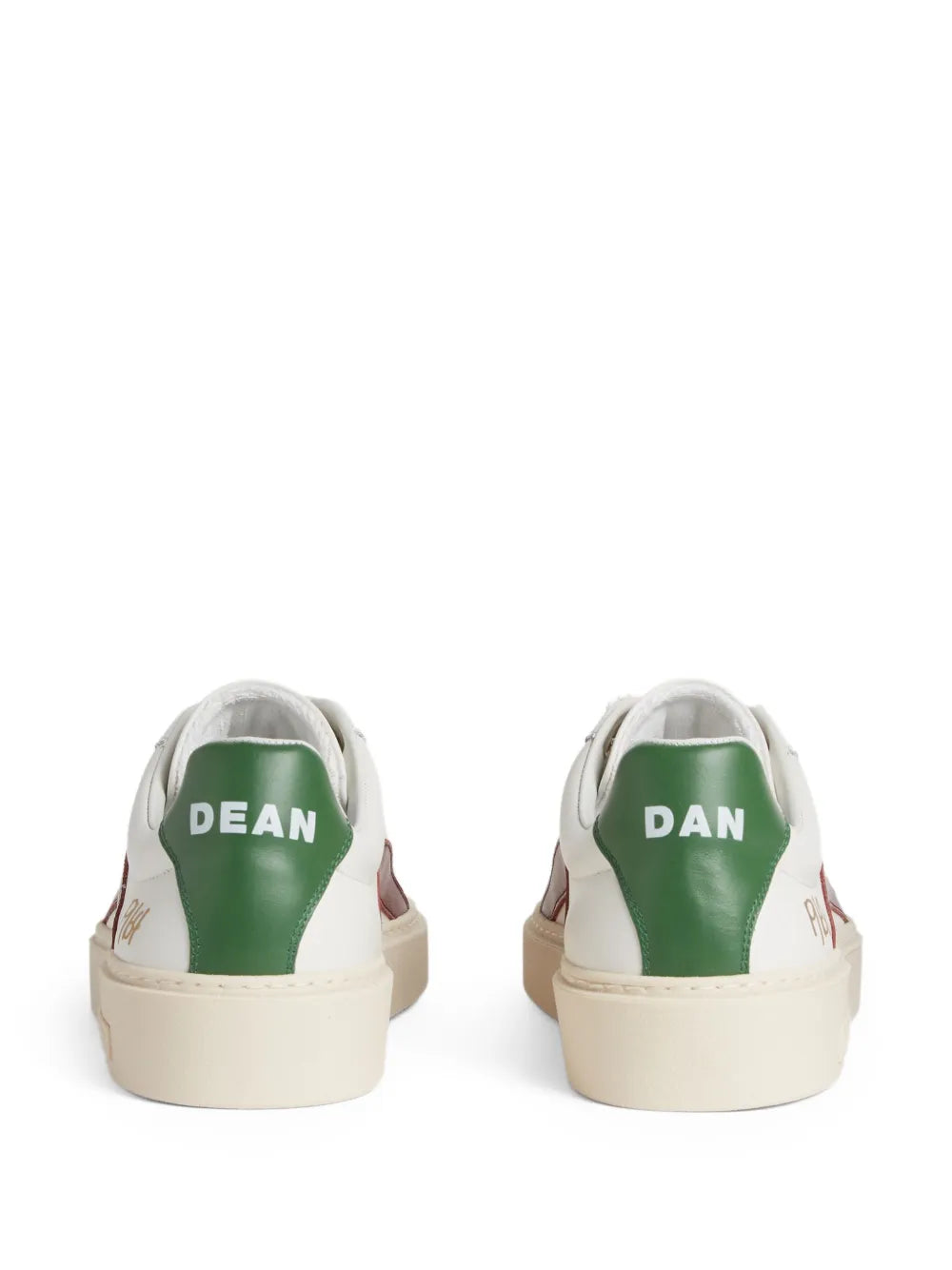 White leather sneakers with green lining and 'DEAN' heel detail