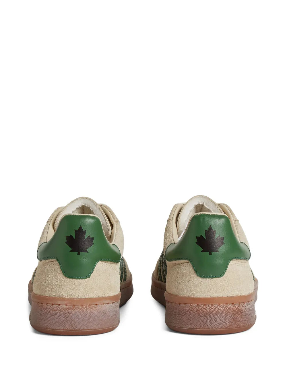 Beige suede sneakers with green heel tabs and brown rubber sole.