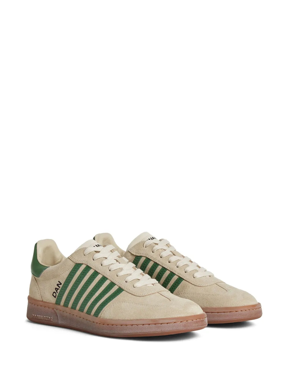 Beige suede lace-up sneakers with green side stripes and brown outsole.