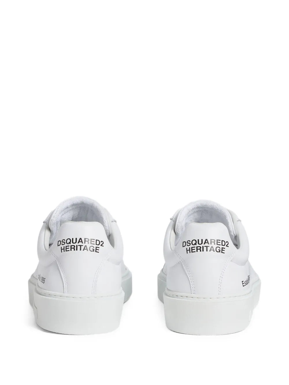 White Dsquared2 sneakers with heel text 'DSQUARED2 HERITAGE'