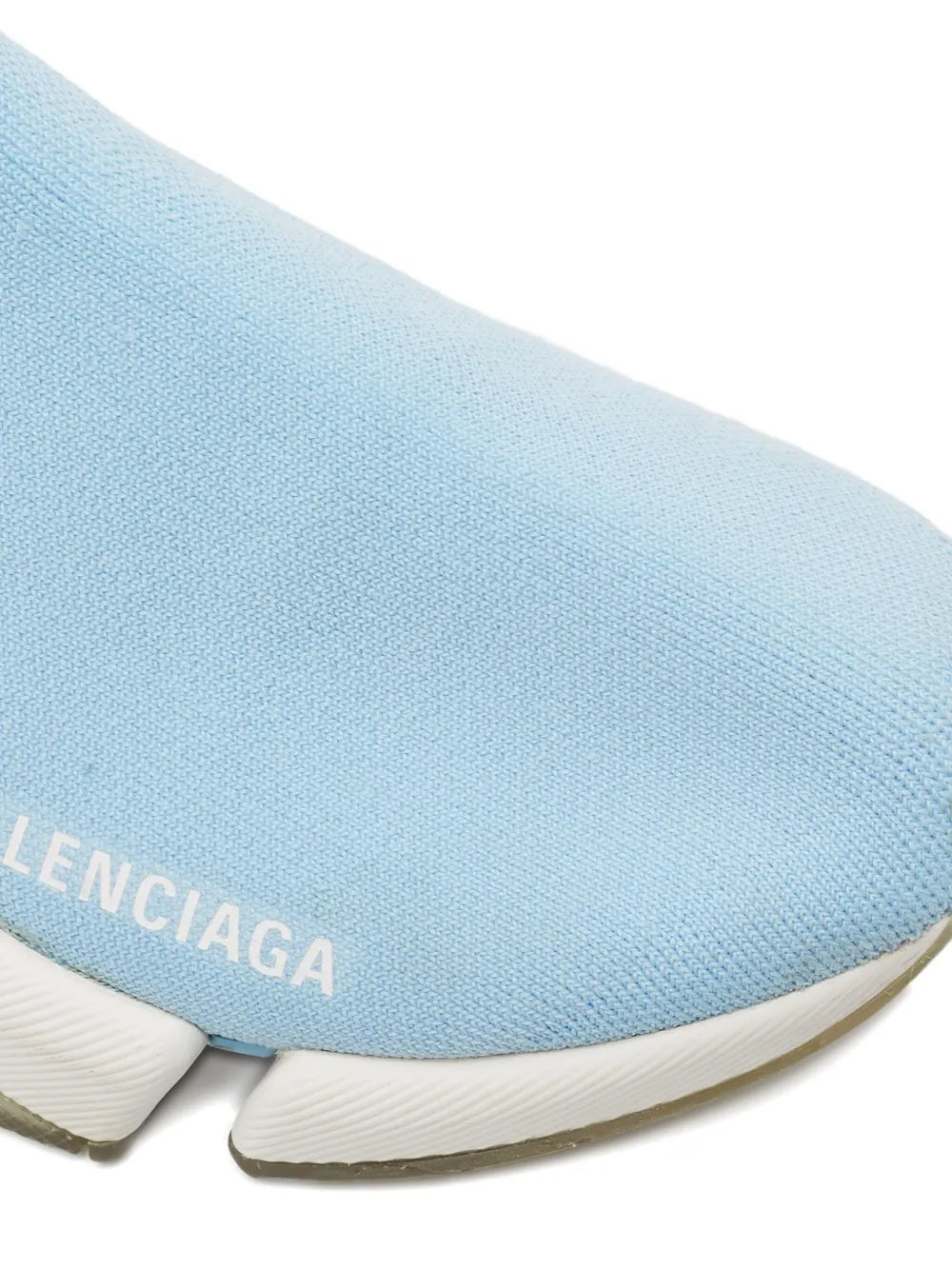 Light blue knit sock sneaker close-up of BALENCIAGA logo and knit fabric