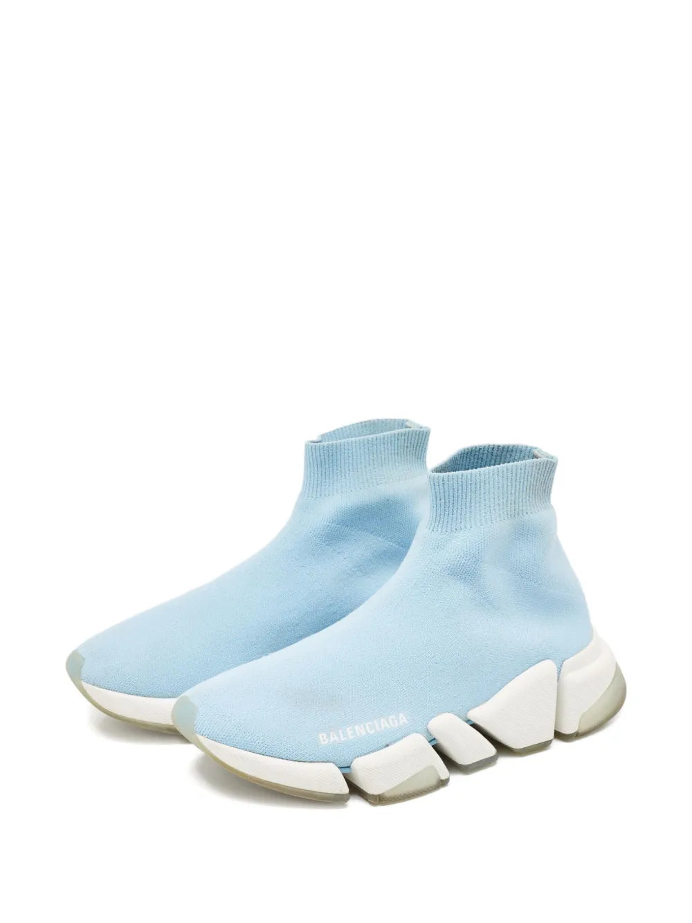 Pair of light blue knit sock sneakers with chunky segmented off-white soles