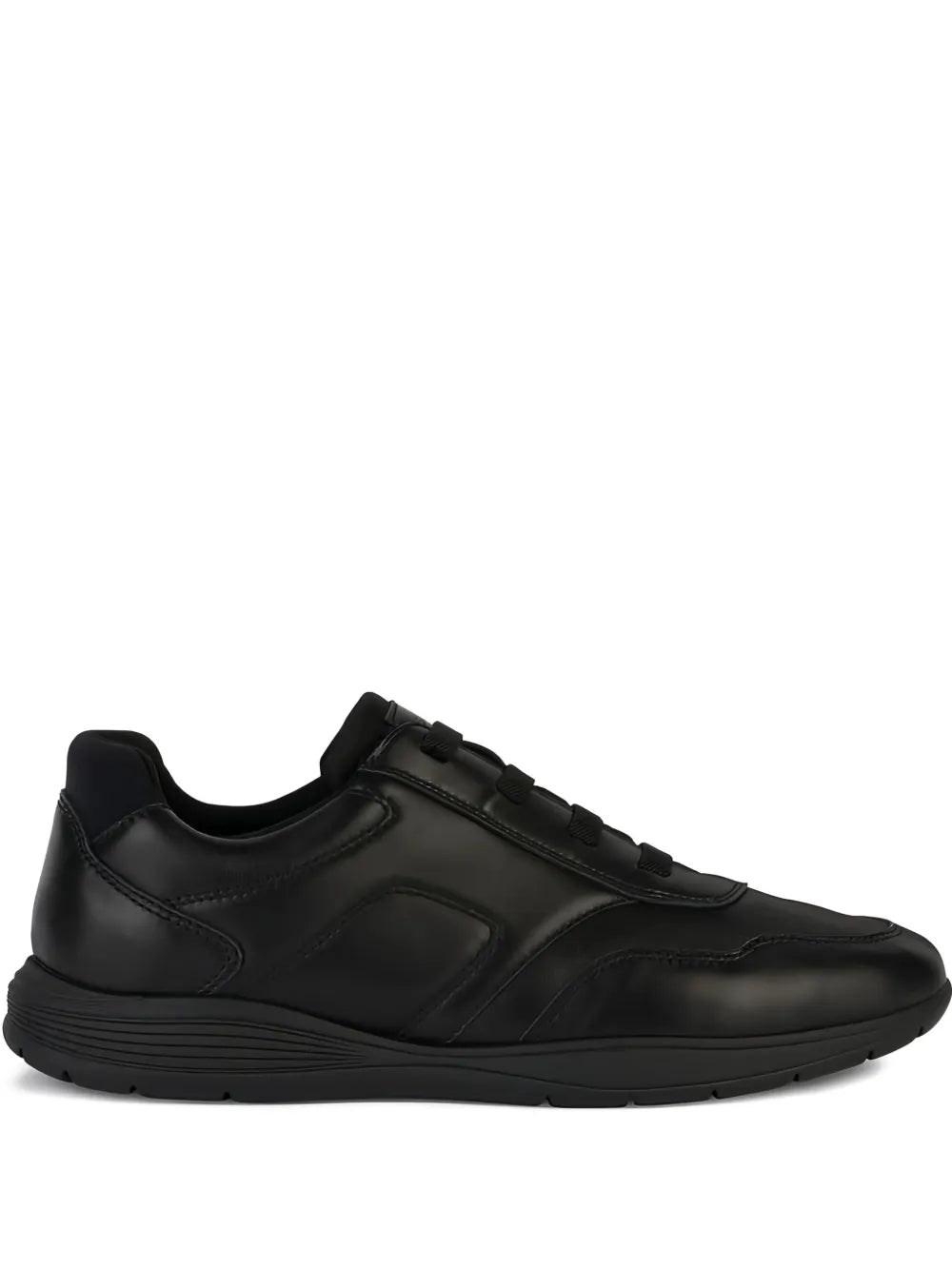 Black low-top sneakers with lace-up closure and cushioned sole
