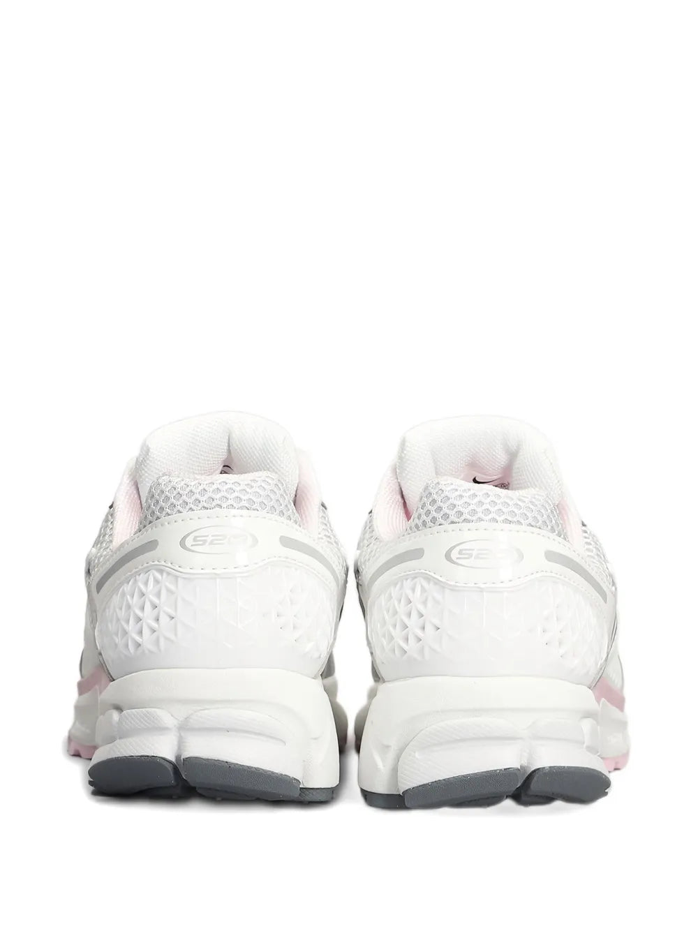 Nike white running shoes, rear view with cushioned heel and gray outsole