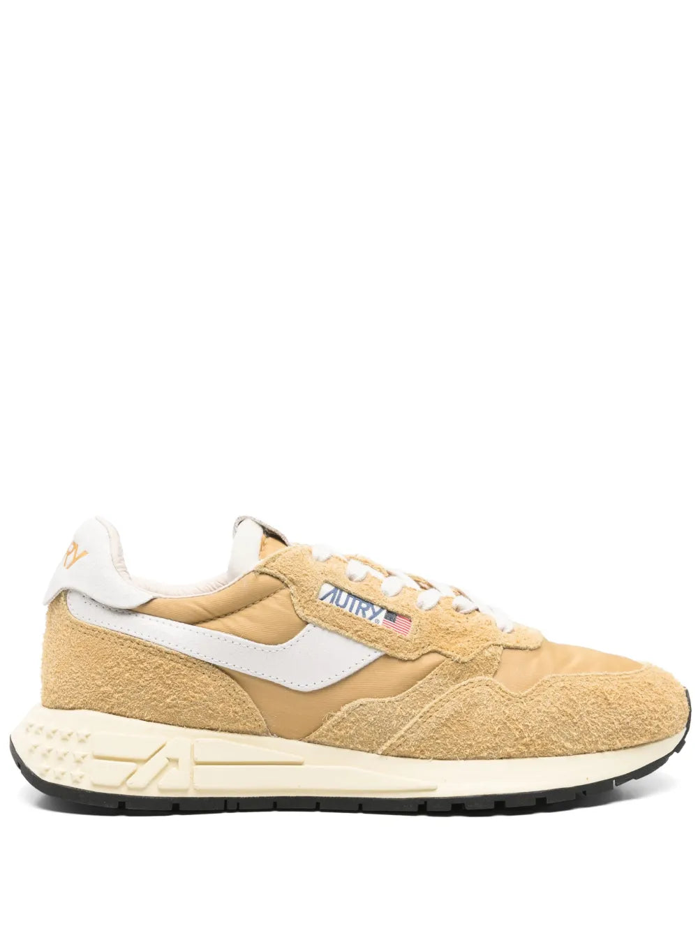 Beige low-top suede sneakers with white side stripe, lace-up front, rubber sole