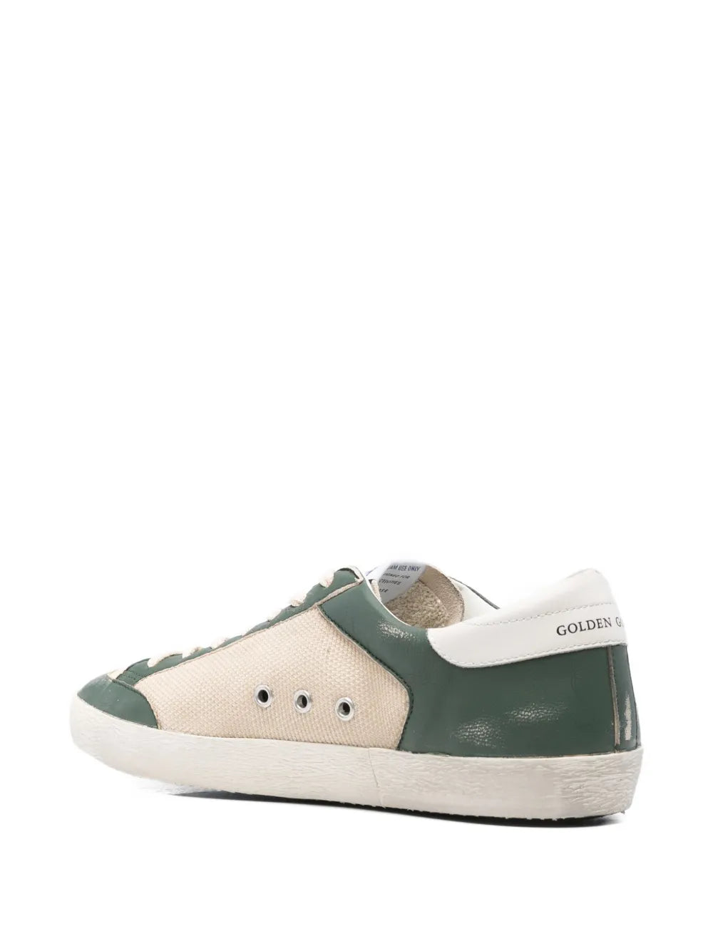 Green and beige leather sneakers with rear tab and white rubber sole